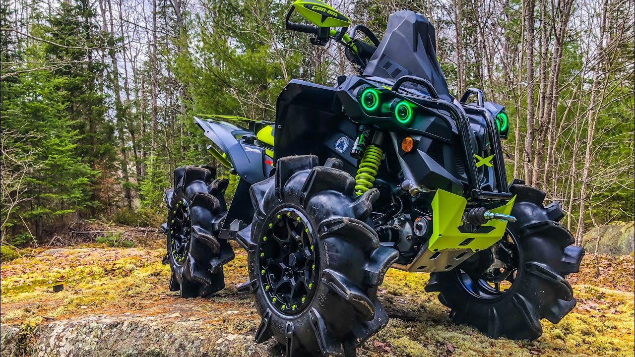 Can-Am Outlander X MR quad bike on rugged off-road trail