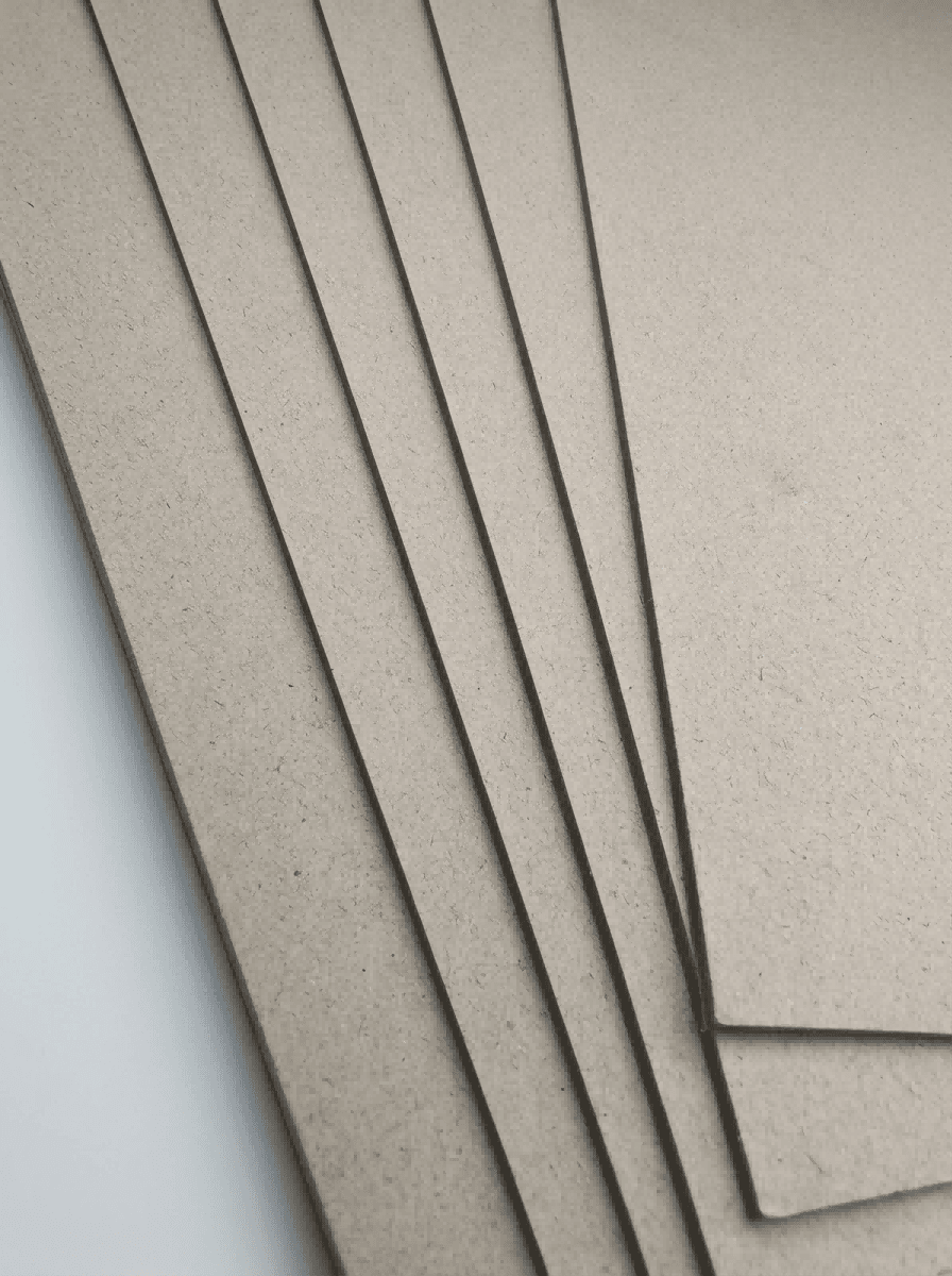 Rigid high gloss laminated paperboard showing thickness and durable structure