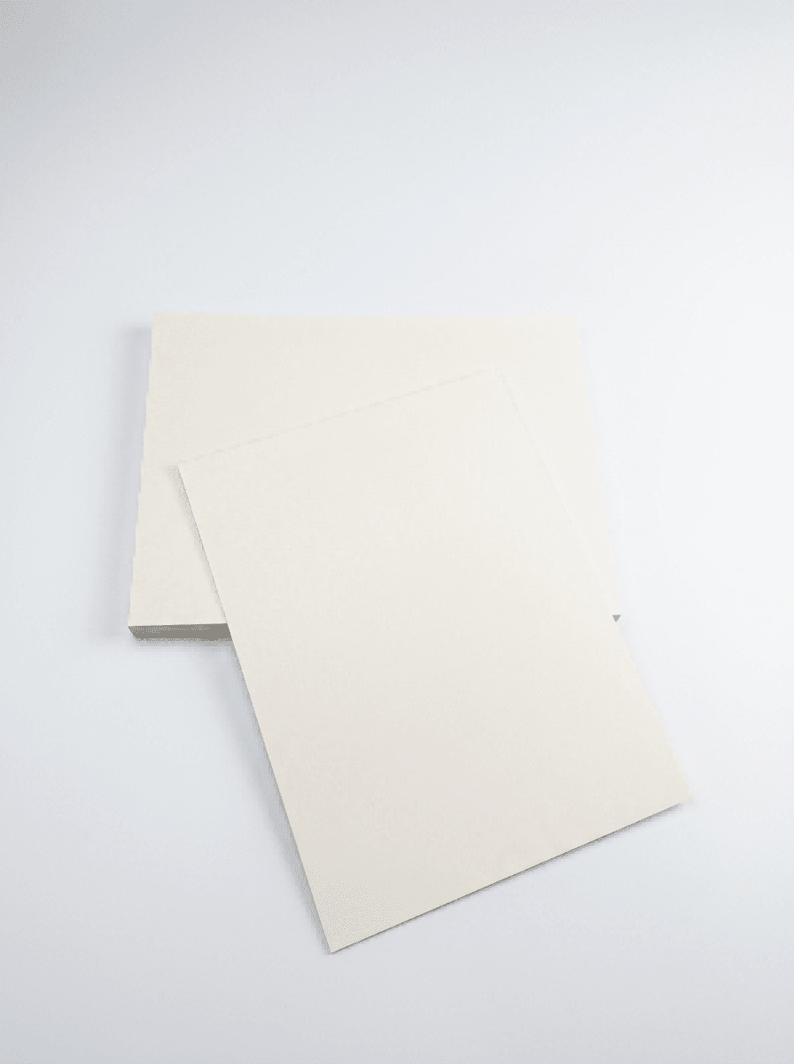 Premium SBS Paperboard sheets stacked in warehouse for luxury packaging and printing applications