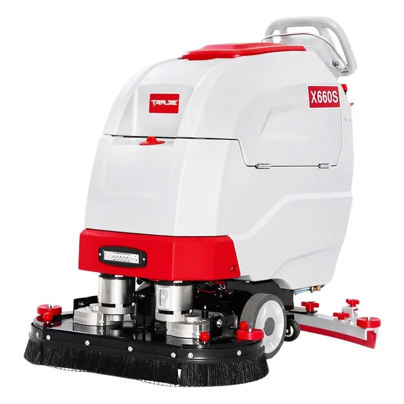 X660S walk-behind floor scrubber in use